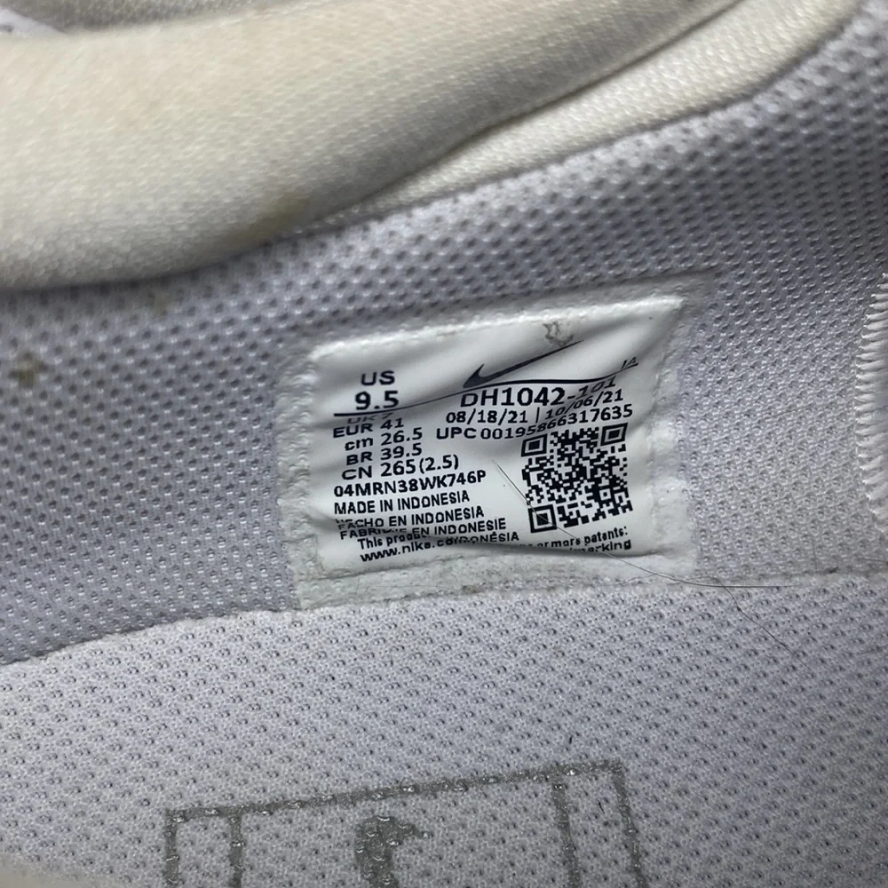 Nike White Sneakers with Silver Swoosh